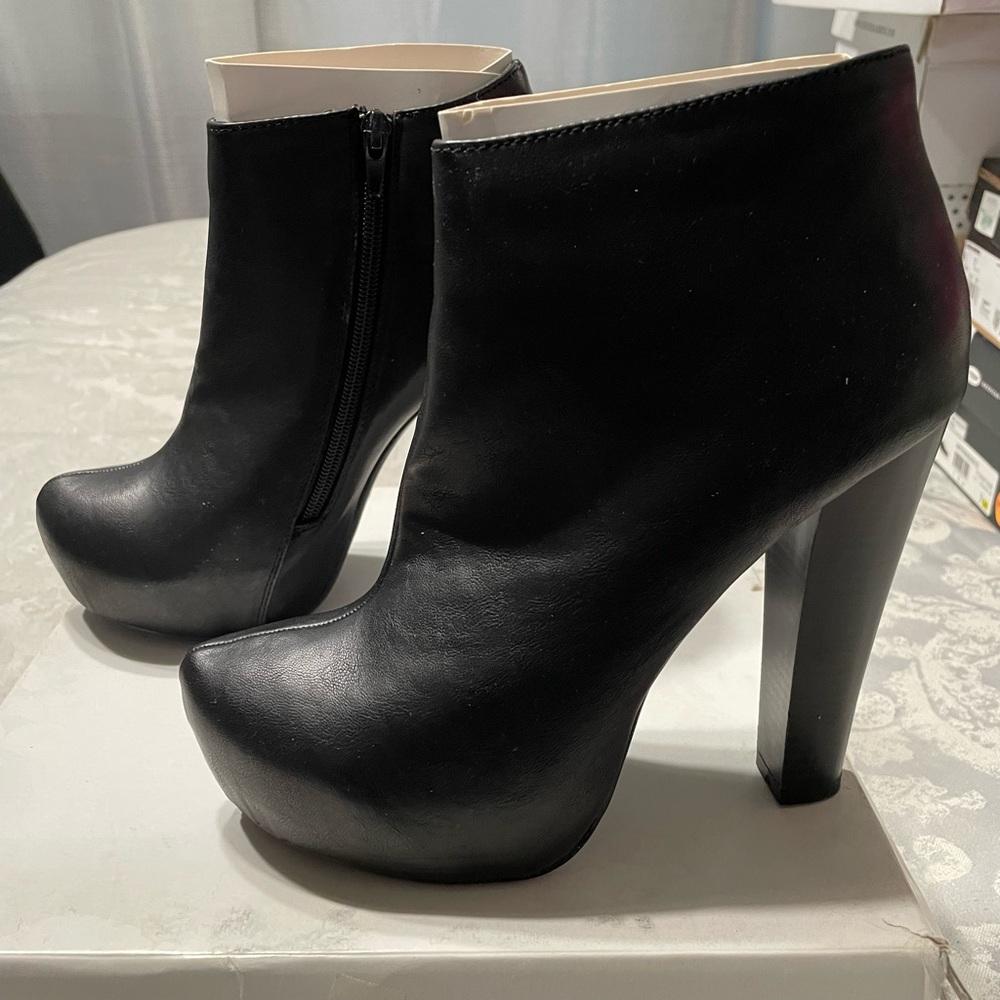 Black faux leather platform boots